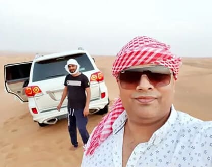 Private red dune safari with sandboarding, camel ride & bbq